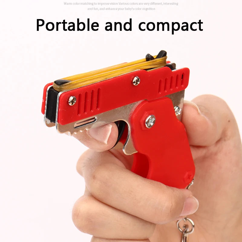 1PC Mini Keychain Gun Rubber Band Gun Toy Gun Shooting Pistol Alloy Kid Outdoor Activities Party Game Birthday Gift for Children